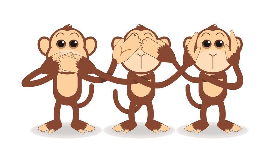 A bright nursery showcases the See No Evil Trio Wall Mural, featuring three cartoon monkeys with "see no evil, hear no evil, speak no evil" gestures. Sunlight streams in over the crib, toys, and rug for a playful touch.