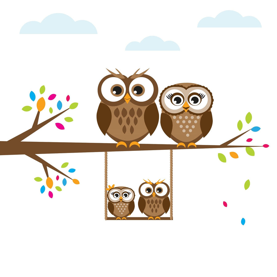 A modern nursery with a white crib and dresser features the Swinging Owl Family Wall Mural—peel and stick accents in neutral tones with colorful owls on branches—plus baby supplies and a large green plant.
