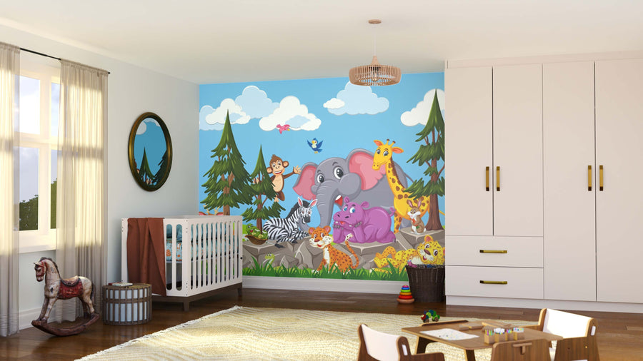 A bright nursery showcases the Wildlife Gathering Wall Mural, featuring cartoon jungle animals amid trees and clouds. The room includes a crib, dresser, mirror, window with curtains, chair, and rocking horse.