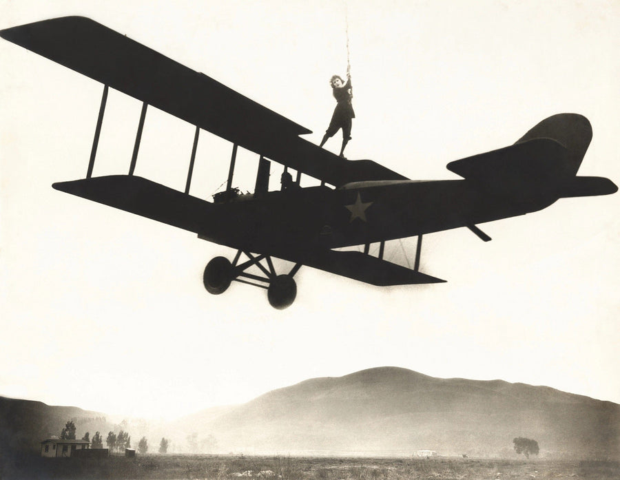 Woman Standing on Biplane Wall Mural Peel and stick Wall Mural Color Original Custom Size