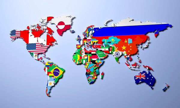 The World Flag Map Wall Mural brightens your space with countries depicted in their flags on a light blue background. Showcasing continents like North America, Europe, and Asia, this removable wallpaper offers an easy peel-and-stick application.