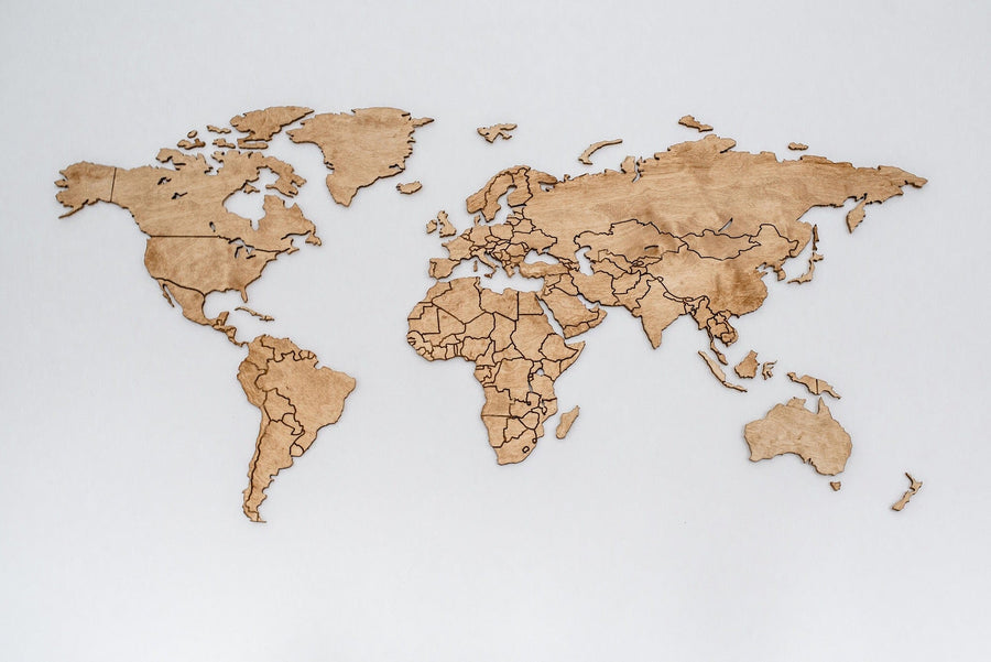 The "World in Wood Wall Mural" features a wooden cutout map on a light gray background, outlining continents and countries with intricate, label-free detail. Its minimalist design transforms into an artistic peel-and-stick wall décor that's easy to apply and reposition.