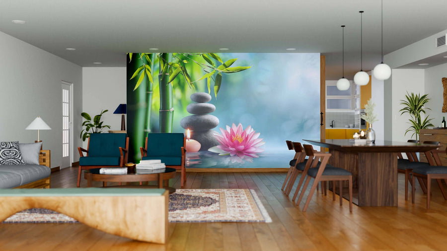 A modern living and dining area features wooden floors, teal chairs, and the Natural Alternative Stones Wall Mural with stacked stones, bamboo, and a lotus flower, adding a serene, spa-like feel to the chic open space with pendant lighting.