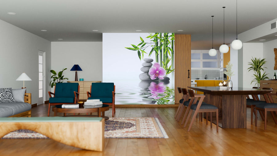 Modern open-plan living and dining room with wood floors and teal accents features the Purple Orchid Wall Mural—showcasing spa stones, bamboo, and a pink orchid reflected in water—as the striking focal point against the kitchen backdrop.