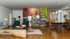 A bright open-plan living and dining area with wooden floors, mid-century furniture, lush plants, a rug, pendant lights, and large Spa Wall Mural featuring spa stones, candles, and bamboo. The space offers a view into the kitchen.