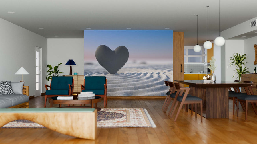 A modern open-plan living and dining area with wooden floors and mid-century furniture features The Love Stone Wall Mural—a peel-and-stick design of a black heart on sand at sunset—adding a serene touch to the contemporary space.
