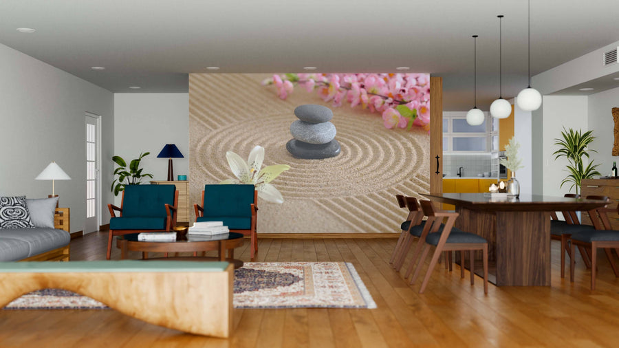 Modern open living and dining area with wood floors, teal chairs, and a long table. The back wall features the Zen Garden Circle Wall Mural—stacked stones, sand patterns, and pink flowers—creating a peaceful atmosphere.