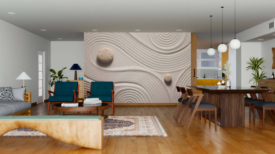 Modern open-plan living and dining area with wood floors, teal chairs, a wooden coffee table, and a textured accent wall featuring the Zen Stones Wall Mural. Pendant lights hang above the wooden dining table.