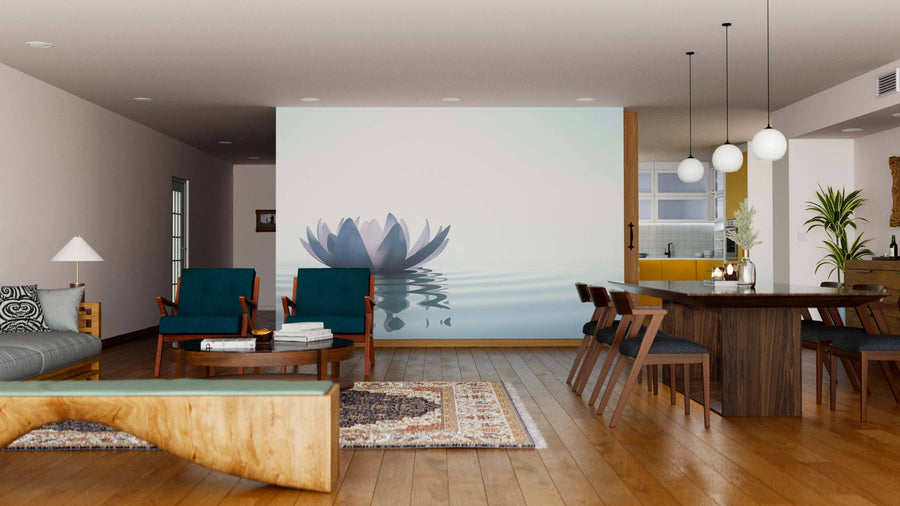 A modern open-plan living and dining area features blue chairs, a wooden coffee table, a patterned rug, the Zen Flower Wall Mural as a large lotus centerpiece, plus mid-century dining chairs, pendant lights, and a kitchen in the background.