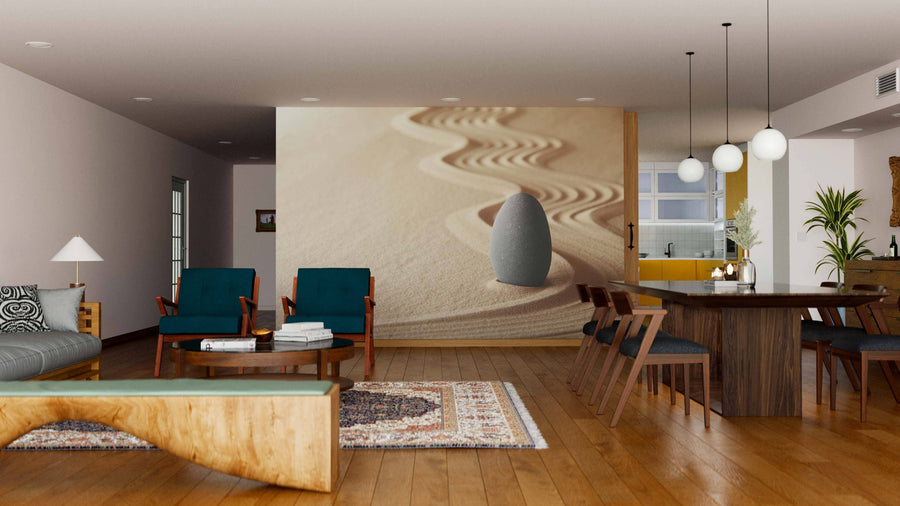 A modern living and dining room features wooden floors, teal armchairs, a low wood coffee table, a six-seat dining table, and the Zen Garden Zig Zag Wall Mural. Pendant lights hang above and a plant sits by the window.