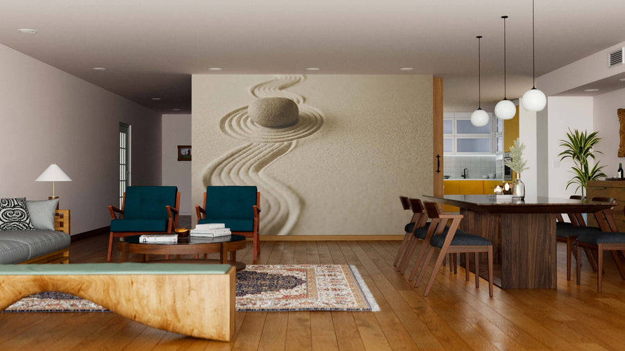 A modern open-plan living and dining area with wooden floors, mid-century furniture, a large Zen Stone Wall Mural behind a dining table for six beneath globe pendant lights, and the kitchen visible in the background.